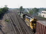 070904155 Westbound BNSF freight passes Midway yard on Midway Sub.